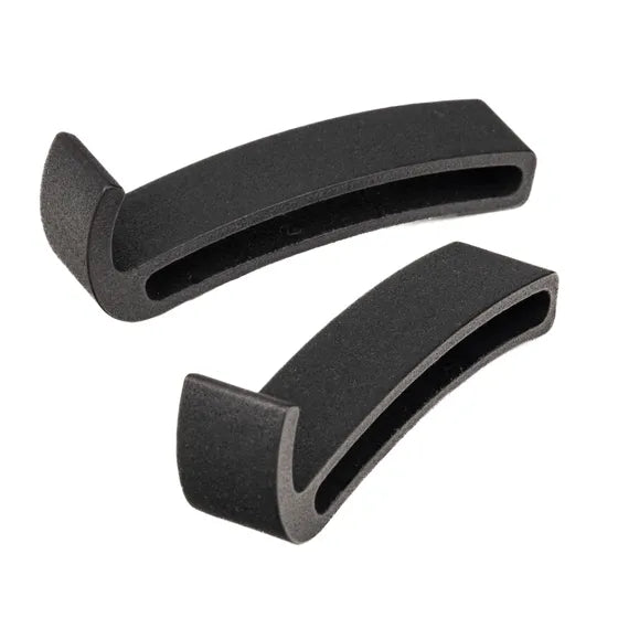 Two black foam handles on a white background