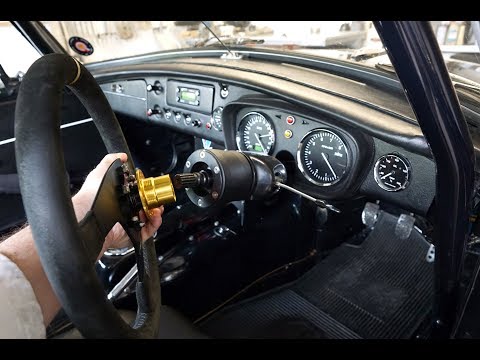 B-G Racing quick release fitted to a motorsport steering wheel