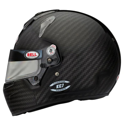 Carbon fiber CMR Karting helmet with Bell logo on a white background
