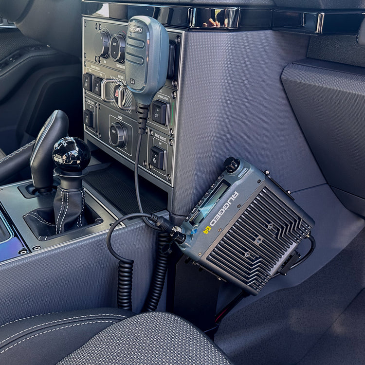 INEOS Grenadier vehicle-specific radio kit components for a UHF CB installation