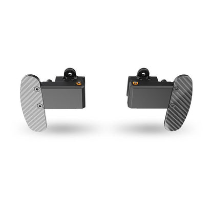 Pair of carbon fiber pedals on a white background