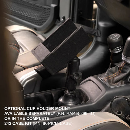 Rugged Radios 242 intercom case mounted on RAM cup holder arm inside vehicle centre console