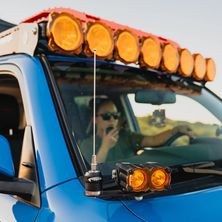 POINT5 UHF CB off-road antenna mounted beside the windscreen on a blue vehicle