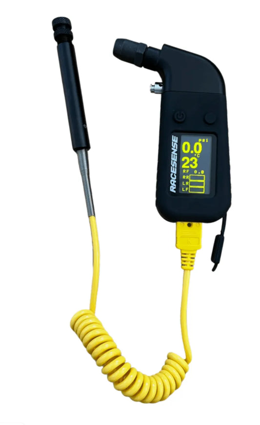 Tire pressure monitor with digital display and yellow coiled cable on a white background