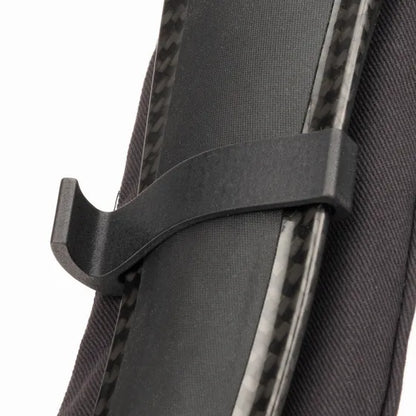 Close-up of a black bow with a sight on a white background