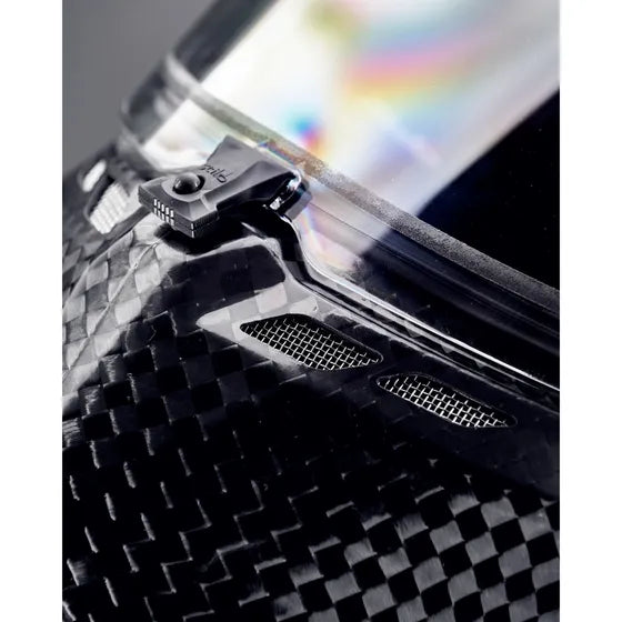 Stilo ST6 CMR Zero Carbon kart helmet — close-up of visor mechanism and chin vent on carbon shell