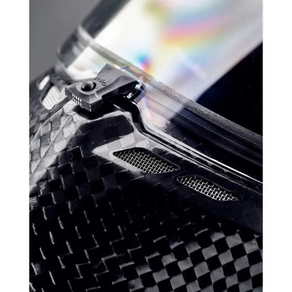Stilo ST6 CMR Zero Carbon kart helmet — close-up of visor mechanism and chin vent on carbon shell