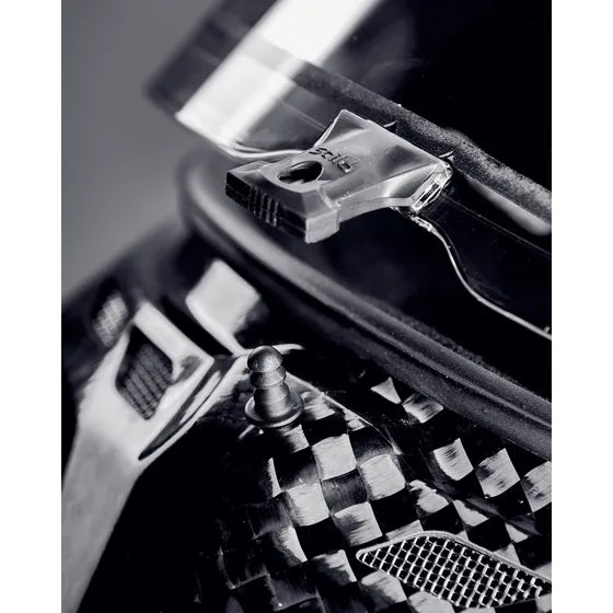 Stilo ST6 CMR Zero Carbon kart helmet — close-up of visor latch and ventilation port on carbon fibre shell
