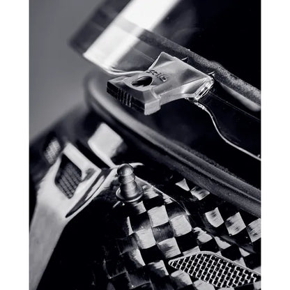 Stilo ST6 CMR Zero Carbon kart helmet — close-up of visor latch and ventilation port on carbon fibre shell