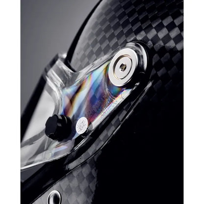 Stilo ST6 CMR Zero Carbon kart helmet — close-up of visor pivot mechanism and anti-fog visor on carbon shell
