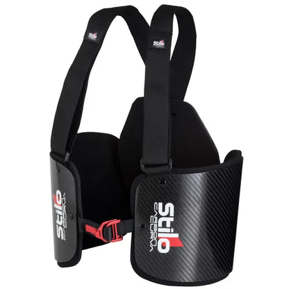 Stilo Carbon Curva kart rib protector — three-quarter view showing carbon fibre rib panels, red buckle and adjustable shoulder harness