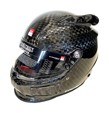 Pyrotect Pro Air Tri-Flow DB Helmet, SA2025, 12K carbon fibre, front three-quarter view with top and side forced-air inlets