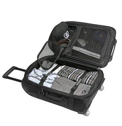 Black suitcase with clothes and a hat on a white background