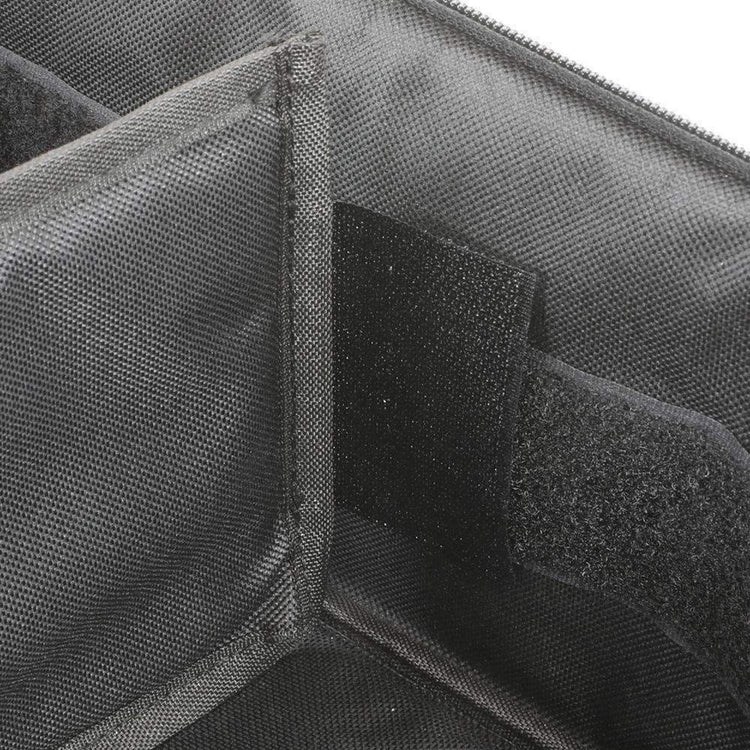 Adjustable padded divider and hook-and-loop attachment inside the Rugged Radios four headset bag